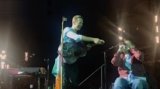 He Crowdsurfed in a Wheelchair to the Stage and Coldplay Pulled Him Up to Play Harmonica (Watch)